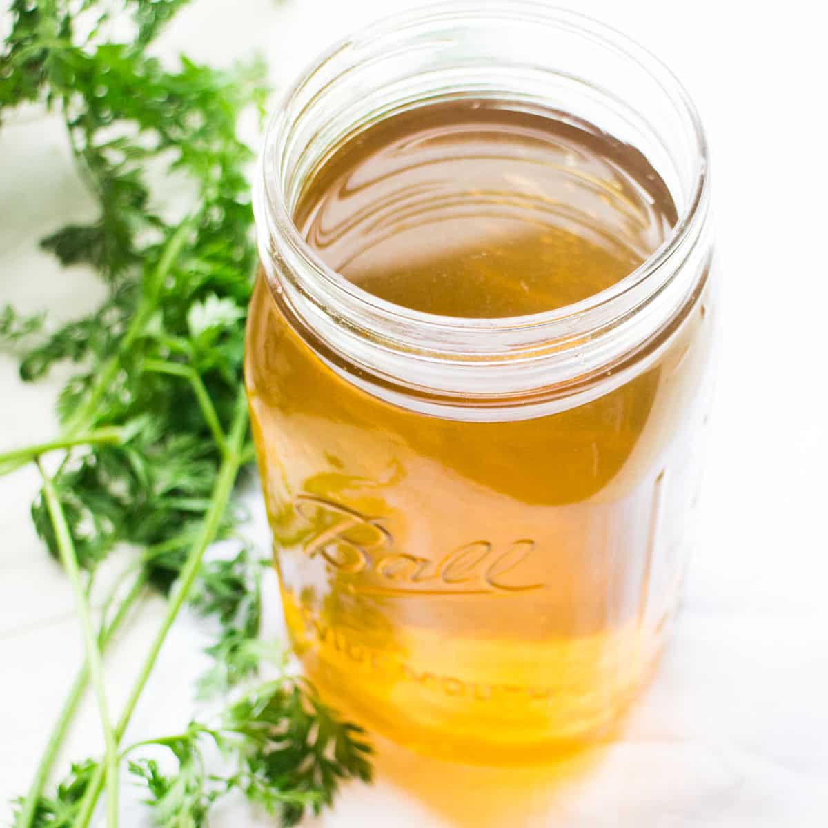 Freeze Homemade Broth: Maximize Carrot Tops, Minimize Waste